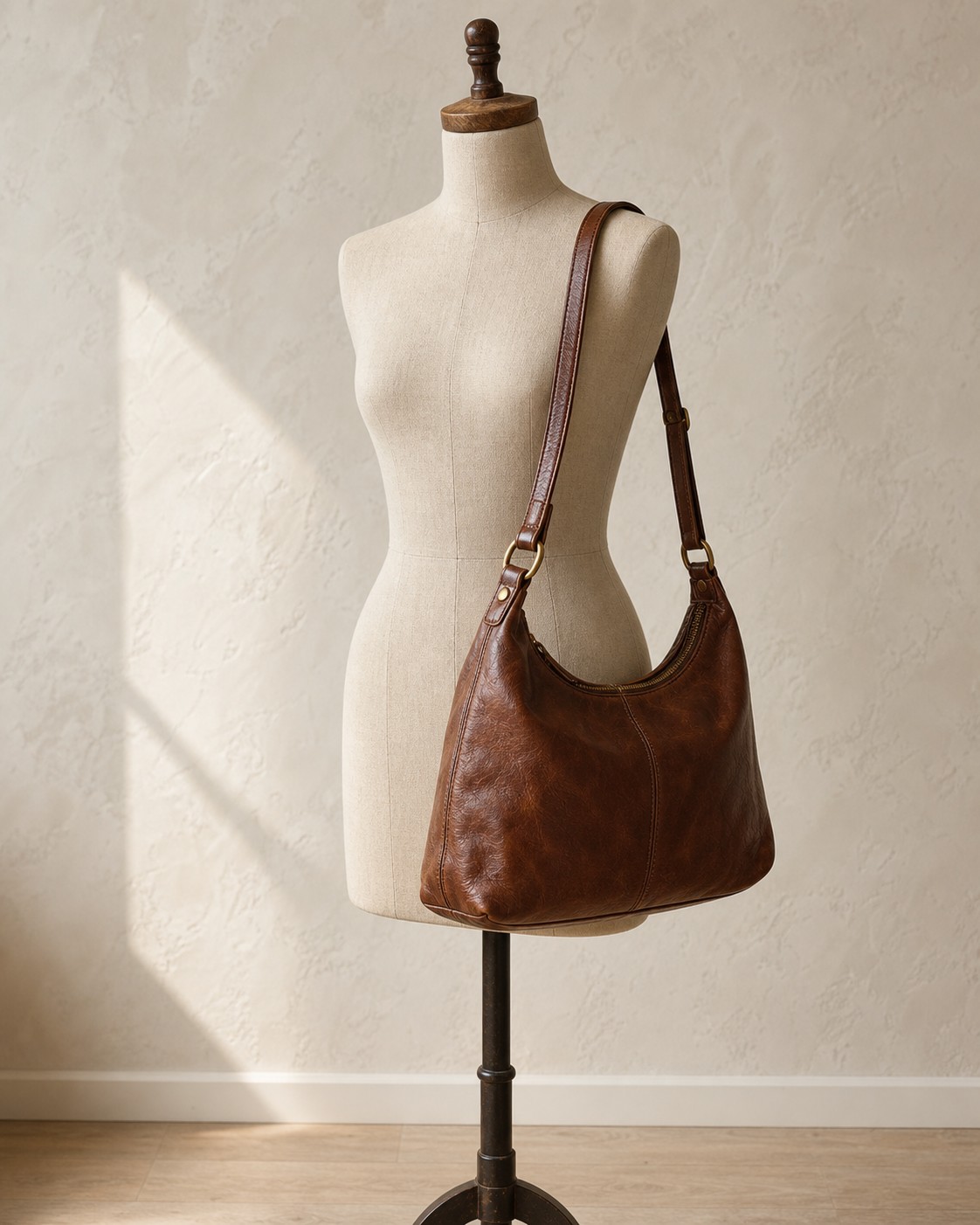 Chestnut leather shoulder bag represented with rich leather texture